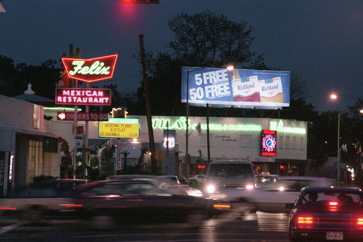 Felix Mexican Restaurant at 904 Westheimer lit up for the evening, 1986.