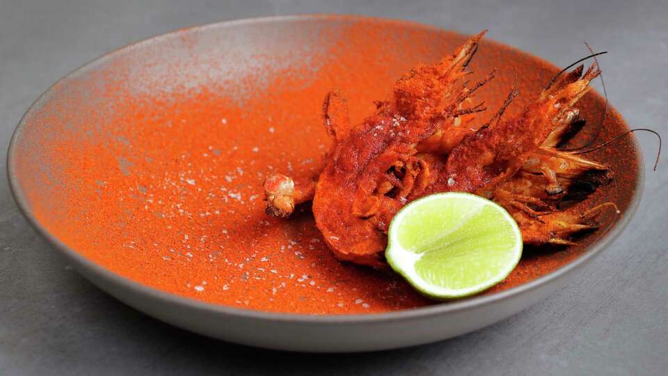 Fire cooked half-shell shrimp from Baso, a new restaurant in The Heights Friday, May 3, 2024 in Houston.