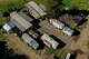 Article Image A cluster of mobile homes at the California Terra Garden, formerly Mountain Mushroom Farm in Half Moon Bay, in January 2023. The deadliest mass shooting in San Mateo County history, in which a gunman killed seven people and injured another, quickly drew attention to poor living conditions and low pay for farmworkers in the region.