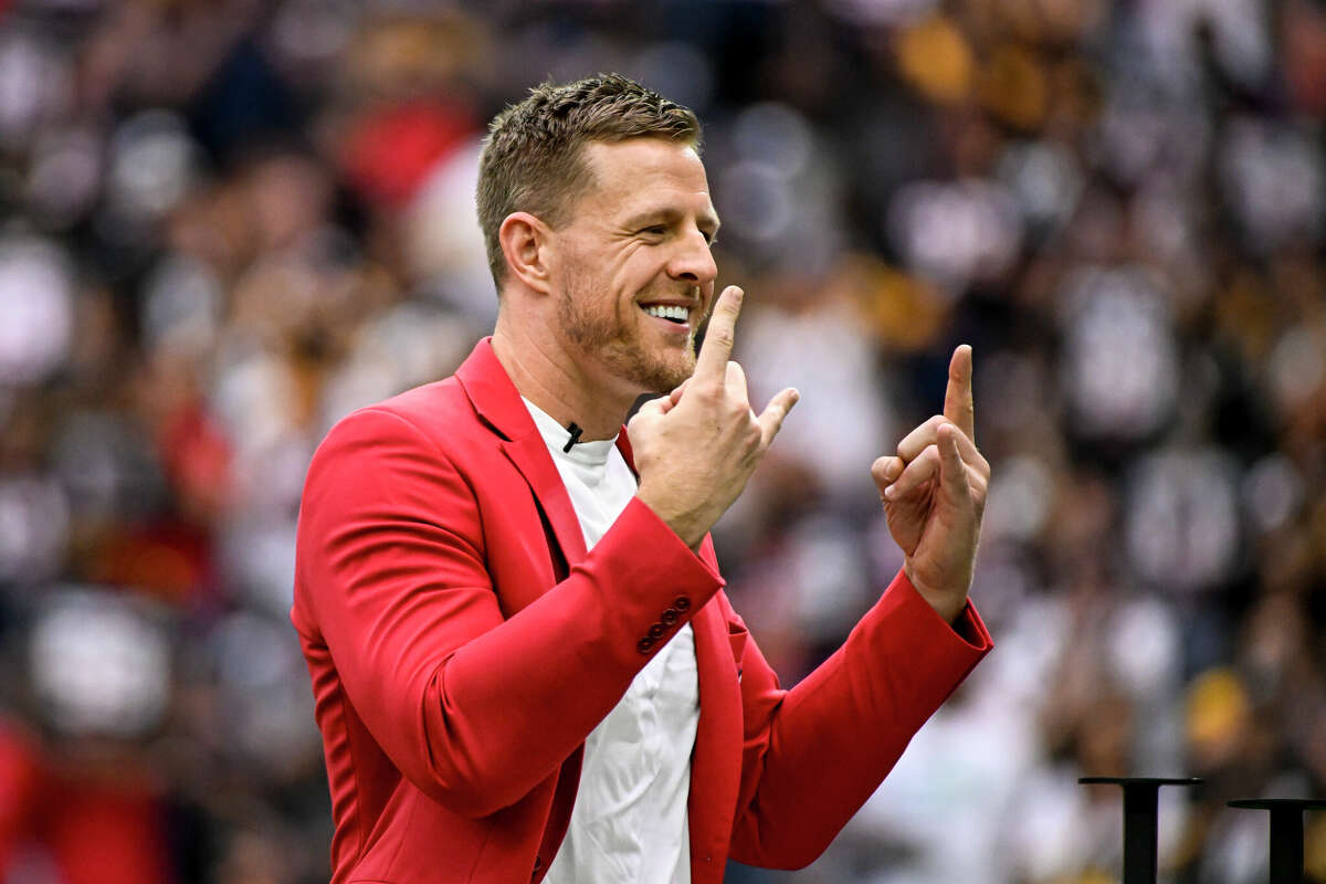 Former Houston Texans player J.J. Watt speaks during a ceremony inducting him into the Texans Ring of Honor during a game against the Pittsburgh Steelers at NRG Stadium on October 01, 2023 in Houston, Texas.