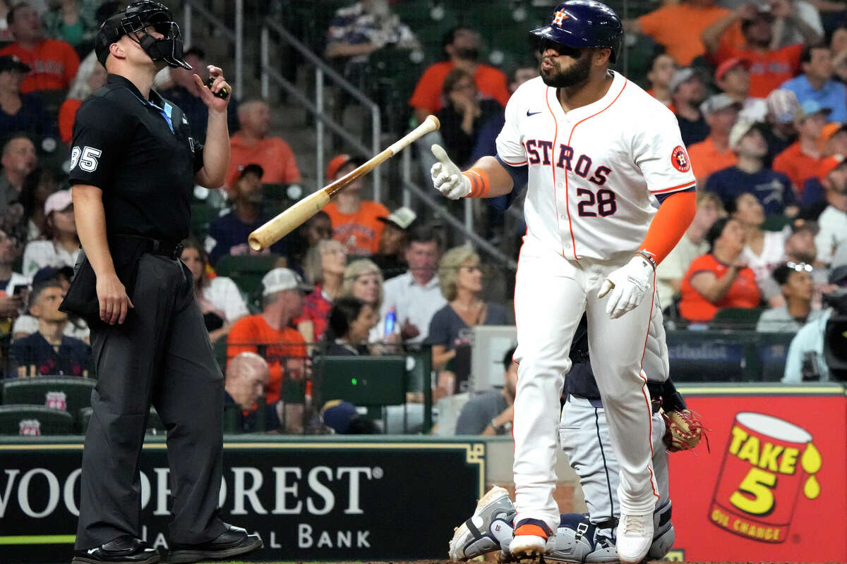 Houston Astros Jon Singleton (28) flips his bat as he flied out during the eighth inning of an MLB game at Minute Maid Park on Tuesday, April 30, 2024, in Houston.