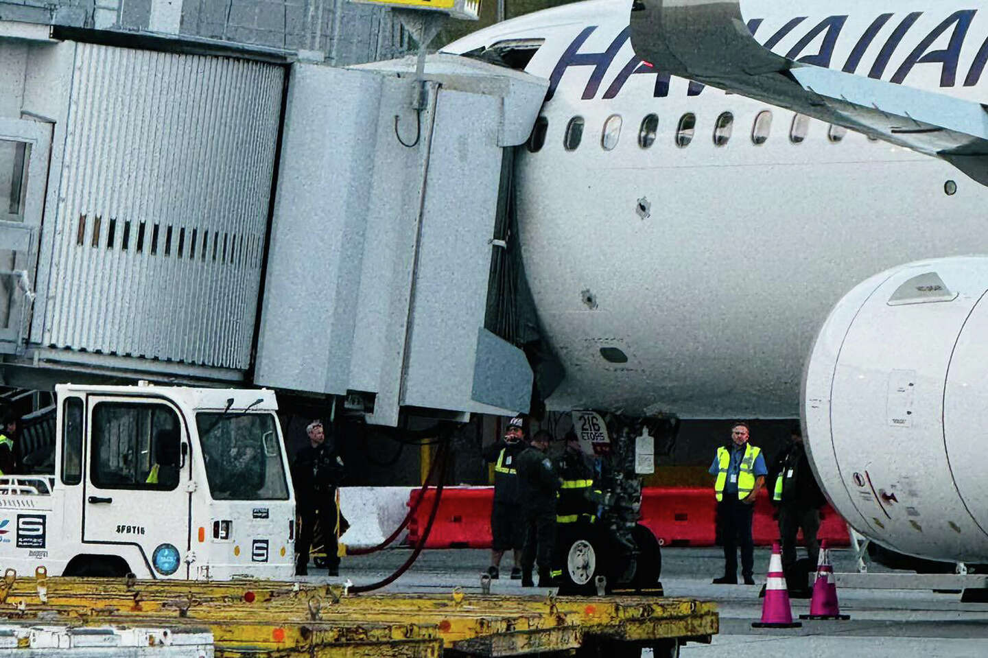 SFO jet bridge fails, collapses on plane