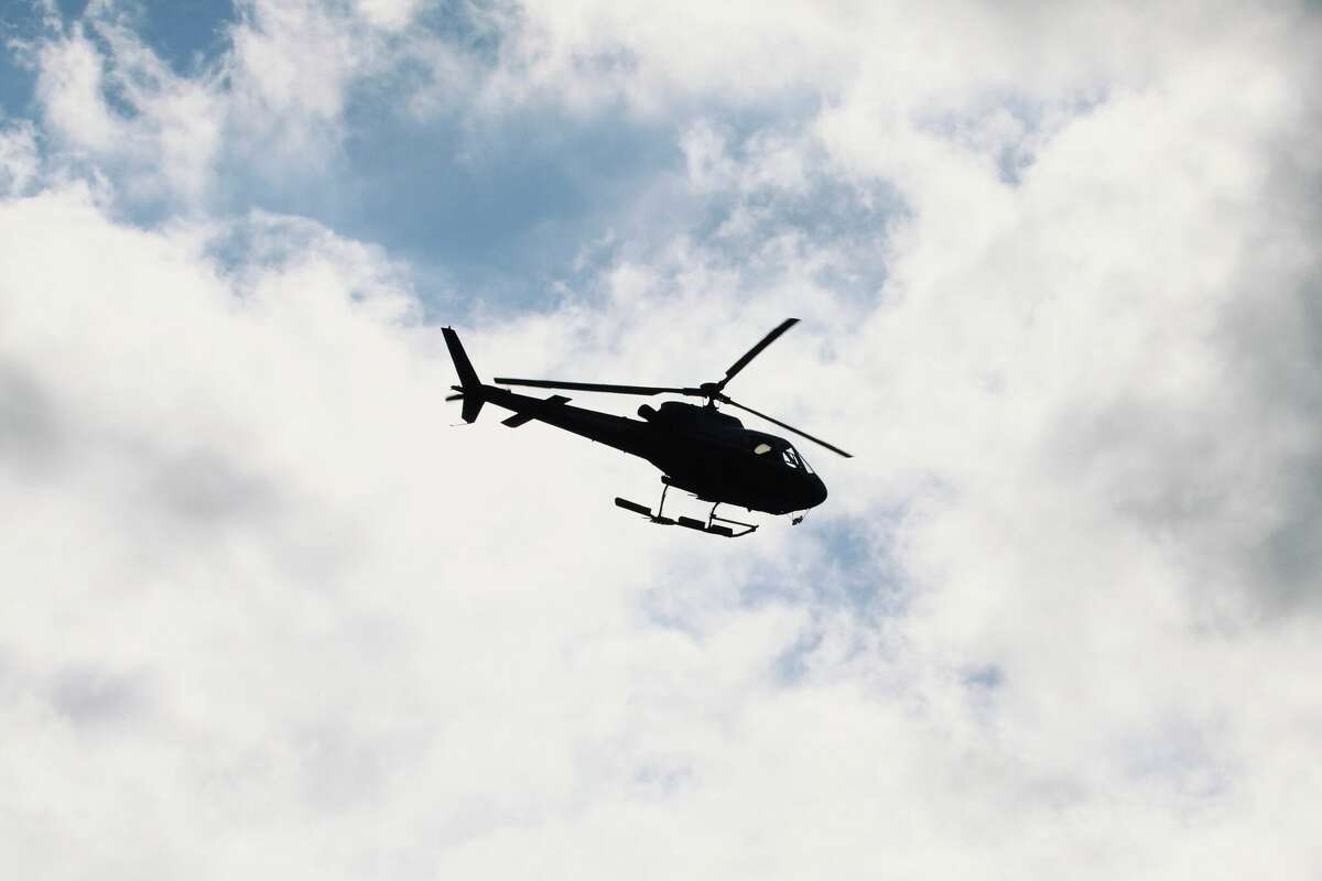 Four people were rescued by a helicopter on Sunday afternoon after their boat capsized in Tomales Bay near Point Reyes. 