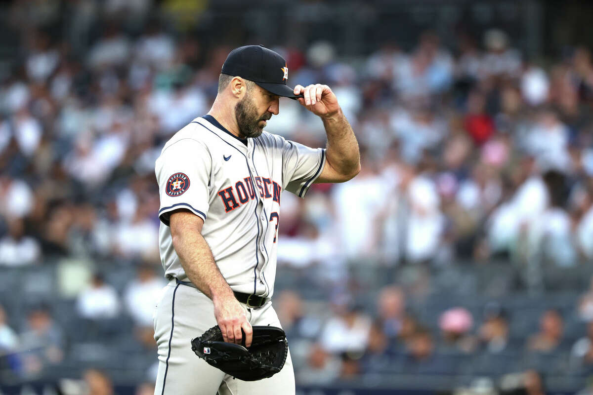 Justin Verlander #35 of the Houston Astros reacts after giving up a three run home run against Alex Verdugo #24 of the New York Yankees.