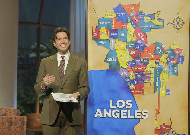 John Mulaney with map of LA during his Netflix special.