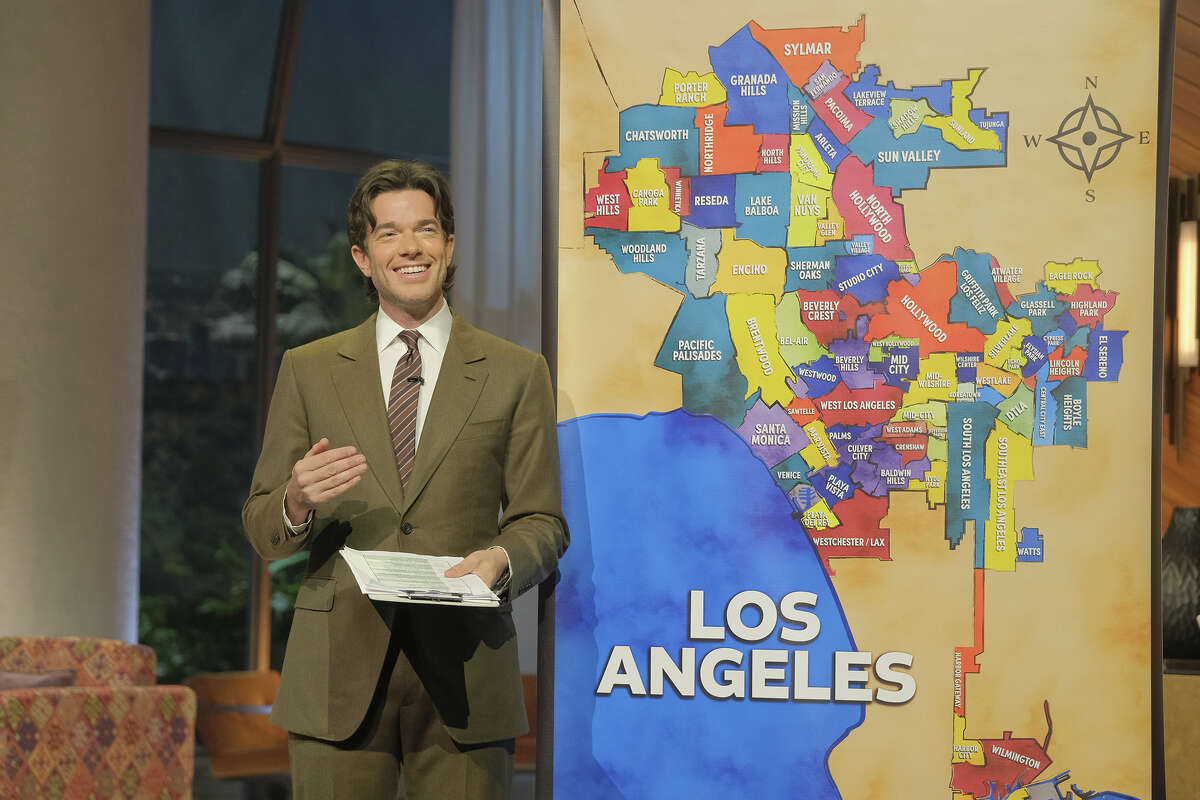 John Mulaney with map of LA during his Netflix special.