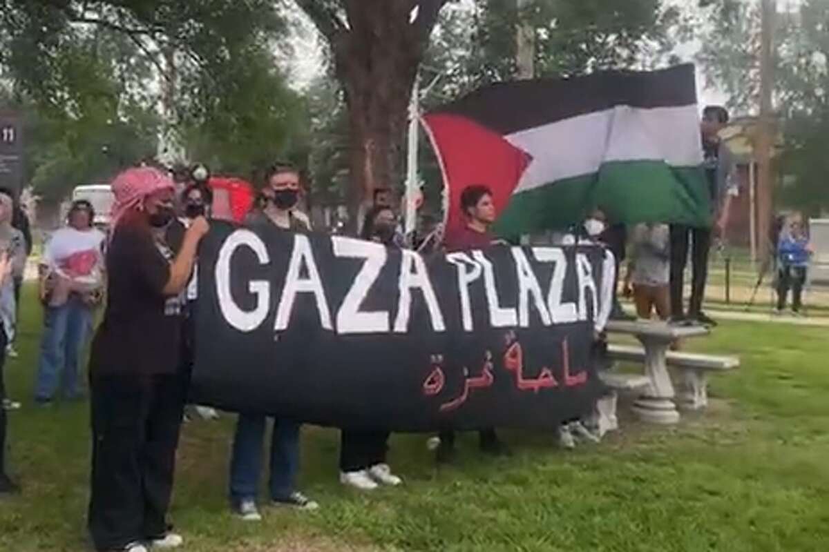 UH students gather outside the Harris County Joint Processing Center on San Jacinto Street on Wednesday to call for the release of students arrested during the dismantlement of a pro-Palestinian encampment.