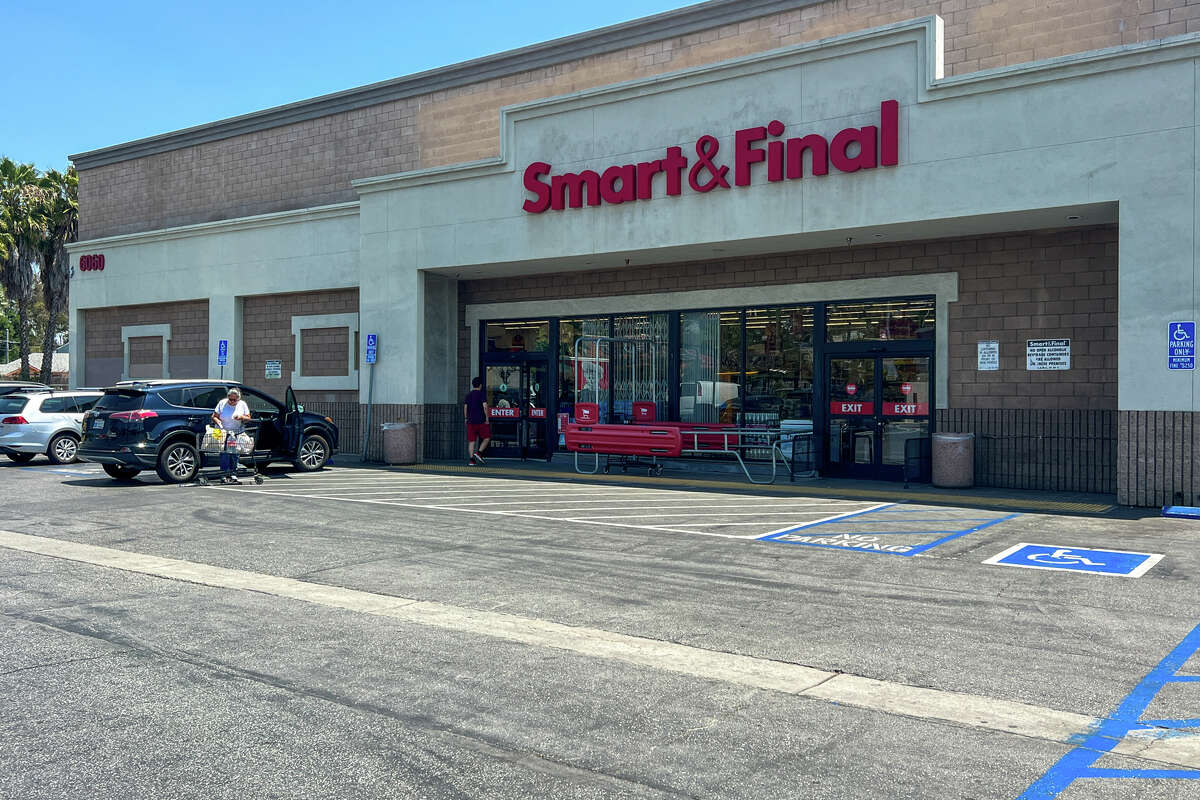 A customer puts away their grocery in their car at Smart & Final in Los Angeles, Calif. on May 8, 2024.