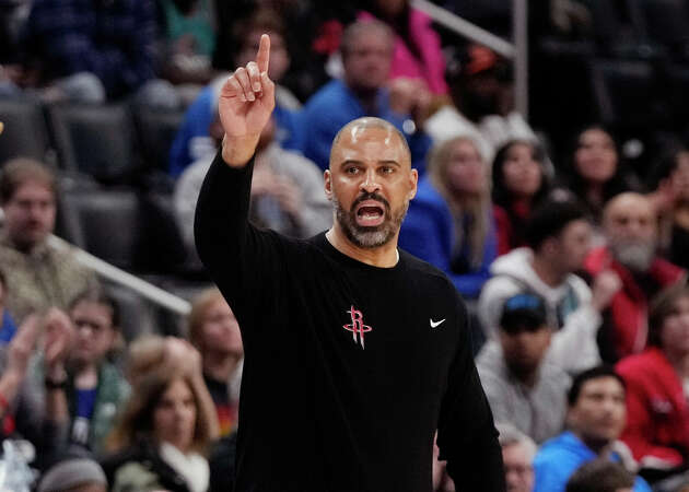 Houston Rockets head coach Ime Udoka signals from the sideline during the second half of an NBA basketball game against the Detroit Pistons, Friday, Jan. 12, 2024, in Detroit.