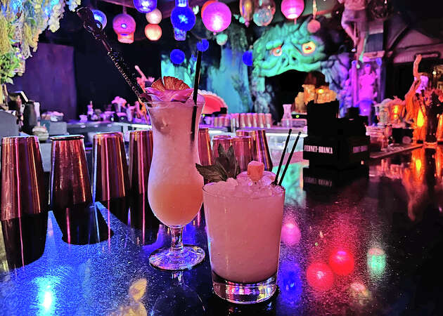 A mai tai (right) with a flaming floater for $1 additional, and a lemba lemba akulapu (right) inspired by the famous aku aku cocktail at the Stardust.