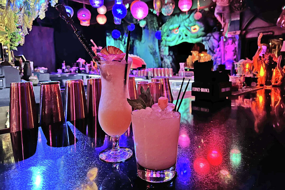 A mai tai (right) with a flaming floater for $1 additional, and a lemba lemba akulapu (right) inspired by the famous aku aku cocktail at the Stardust.