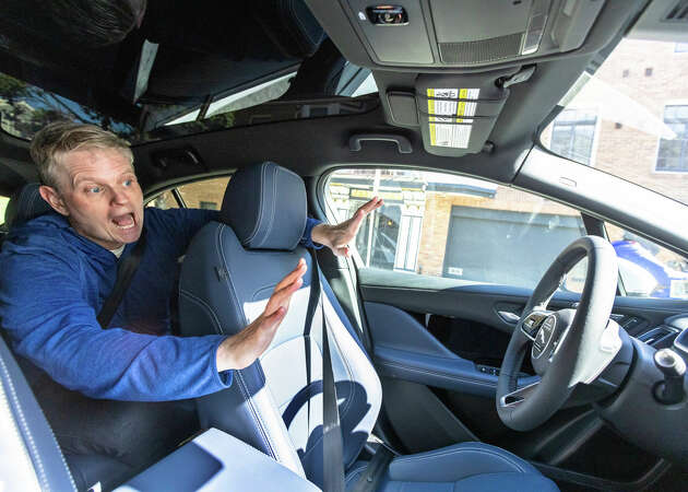 SFGATE columnist Drew Magary takes a ride in a Waymo, a self-driving autonomous vehicle available for ride hailing in San Francisco, Calif. on May 7, 2024.