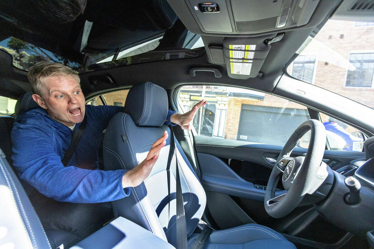 SFGATE columnist Drew Magary takes a ride in a Waymo, a self-driving autonomous vehicle available for ride hailing in San Francisco, Calif. on May 7, 2024.