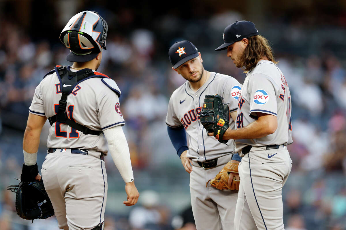 Alex Bregman #2 and Yainer Diaz #21 of the Houston Astros visit Spencer Arrighetti #41 at the mound during the second inning against the New York Yankees at Yankee Stadium on May 08, 2024 in the Bronx borough of New York City. 