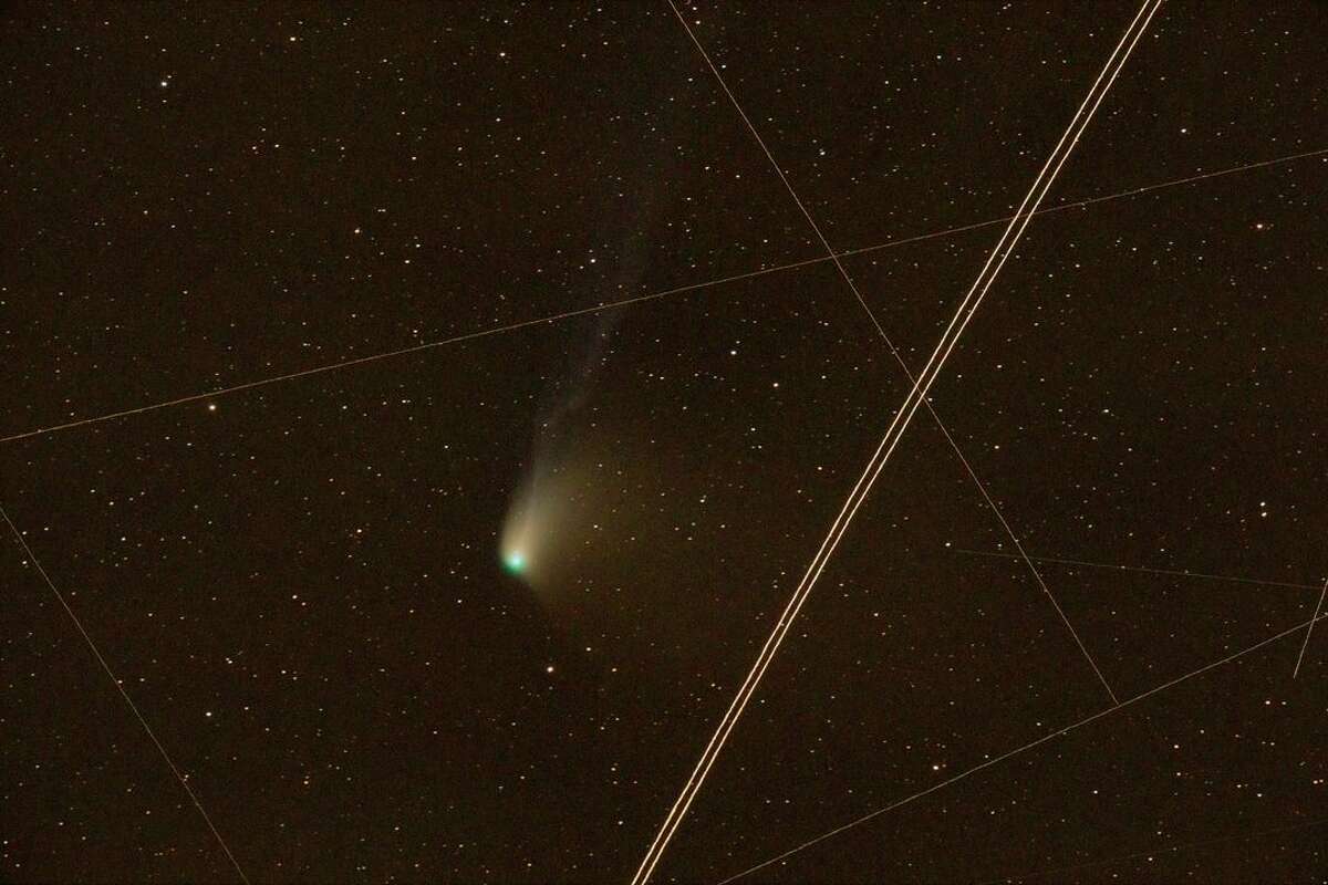 New Zealand photographer Ian Griffin recently captured SpaceX Starlink satellites crisscrossing over his view of Comet 12/Pons-Brooks. 