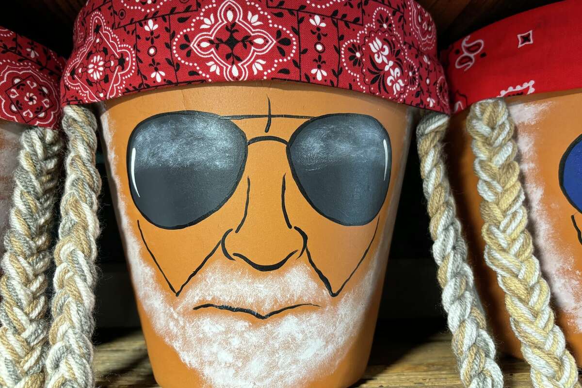 Helen Saldivar's Willie Nelson flowerpots are rapidly becoming a collector's item in Galveston.