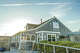 Diners looking for sunset ambiance can enjoy dockside views of the receding sunlight at Breakwater in Stonington, photographed May 2024.