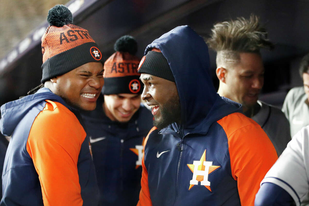 Framber Valdez #59 and Cristian Javier #53 of the Houston Astros react in the dugout during the third inning against the New York Yankees in game four of the American League Championship Series at Yankee Stadium on October 23, 2022 in the Bronx borough of New York City.