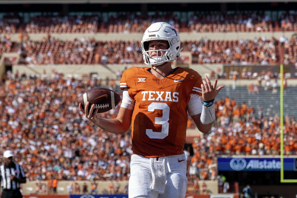 Texas Longhorns quarterback Quinn Ewers (3) celebrates after scoring a touchdown during the college football game between Texas Longhorns and Rice Owls on September 2, 2023, at Darrell K Royal-Texas Memorial Stadium in Austin, Texas.