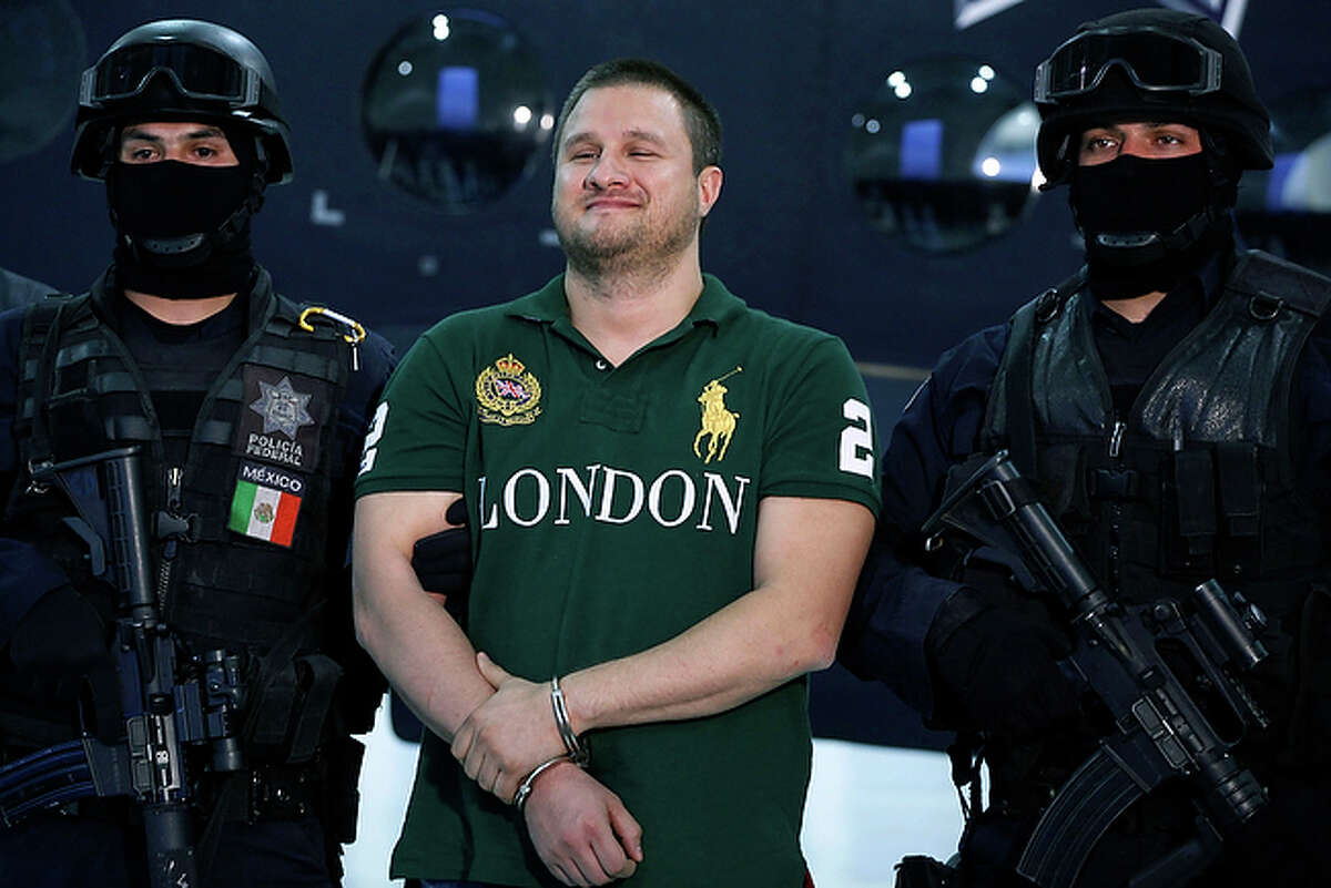 Captured:Edgar Valdez Villarreal, who was born in Laredo and is nicknamed La Barbie for his light hair and eyes, was arrested in Mexico on Aug. 30, but did not look fearful of his fate. He even smirked when paraded in front of reporters while flanked by masked federal agents.