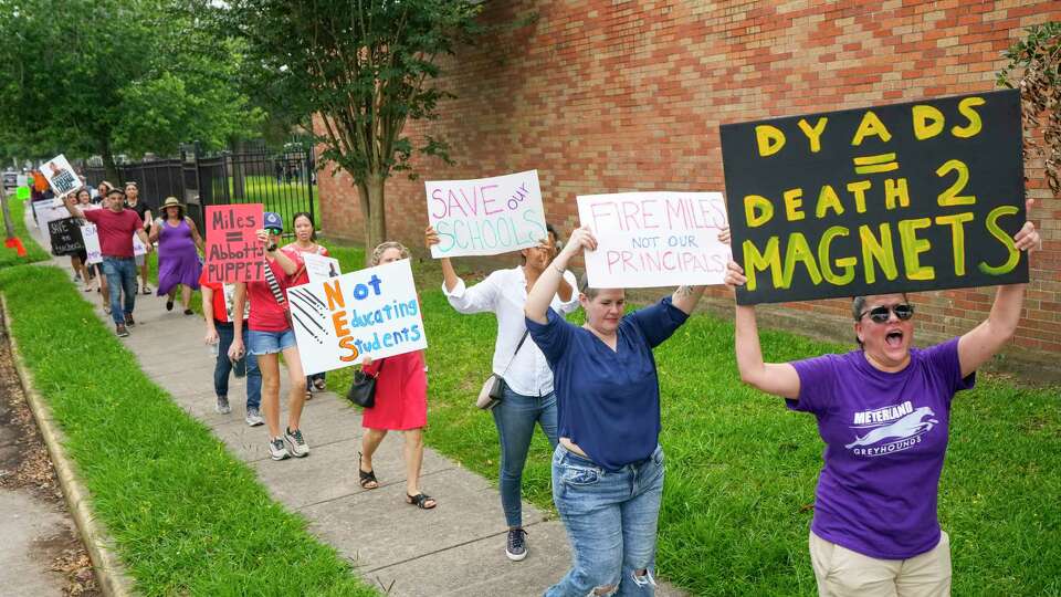 Meyerland Performing and Visual Arts Middle School parents and students demonstrate against the resignation notice of Principal Auden Sarabia on Monday, May 13, 2024 in Houston. Sarabia told staff he must either resign by Tuesday or go before the district's Board of Managers.