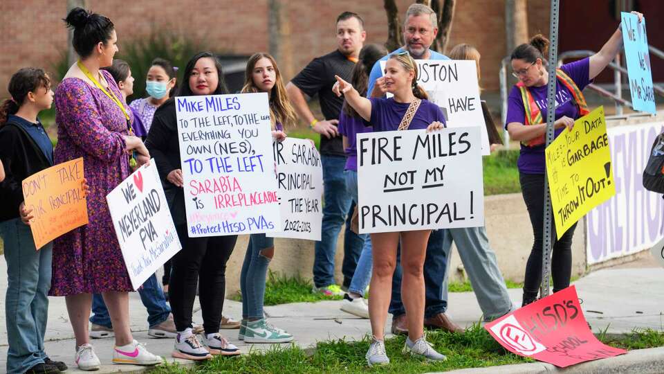 Meyerland Performing and Visual Arts Middle School parents and students demonstrate against the resignation notice of Principal Auden Sarabia on Monday, May 13, 2024 in Houston. Sarabia told staff he must either resign by Tuesday or go before the district's Board of Managers.