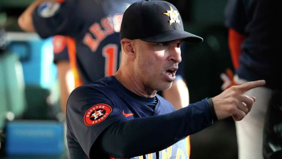 Houston Astros manager Joe Espada in the dugout before the start of the first inning of an MLB baseball game at Minute Maid Park on Wednesday, May 15, 2024, in Houston.