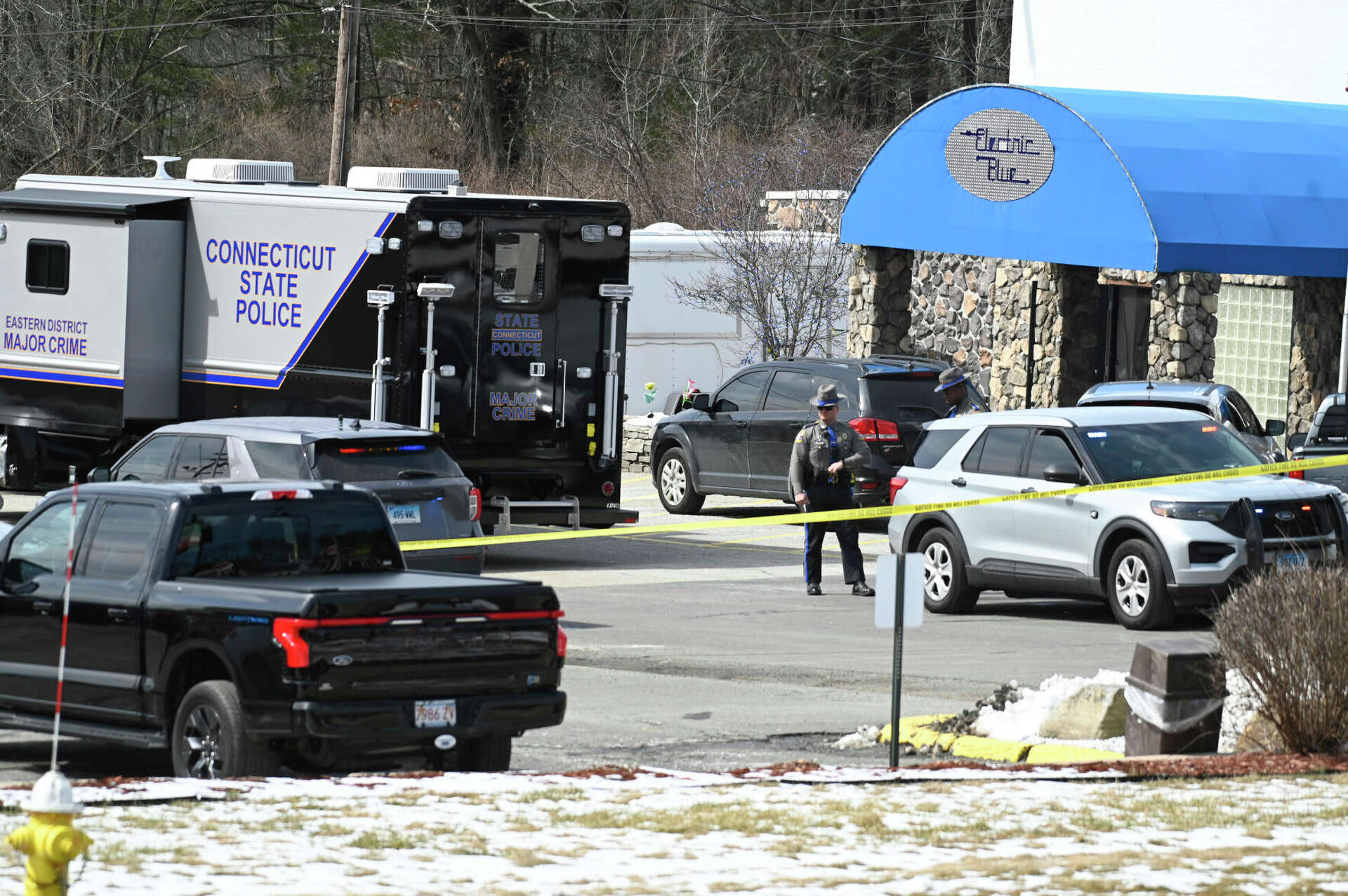 Police: Tolland strip club owner kept loaded assault weapon on site