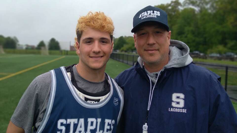 Staples boys lacrosse junior goalie Josh Marcus, left, and his father, Staples assistant coach Jon Marcus, photographed at Bedford Middle School in Westport, Conn., on Wednesday, May 15, 2024. 