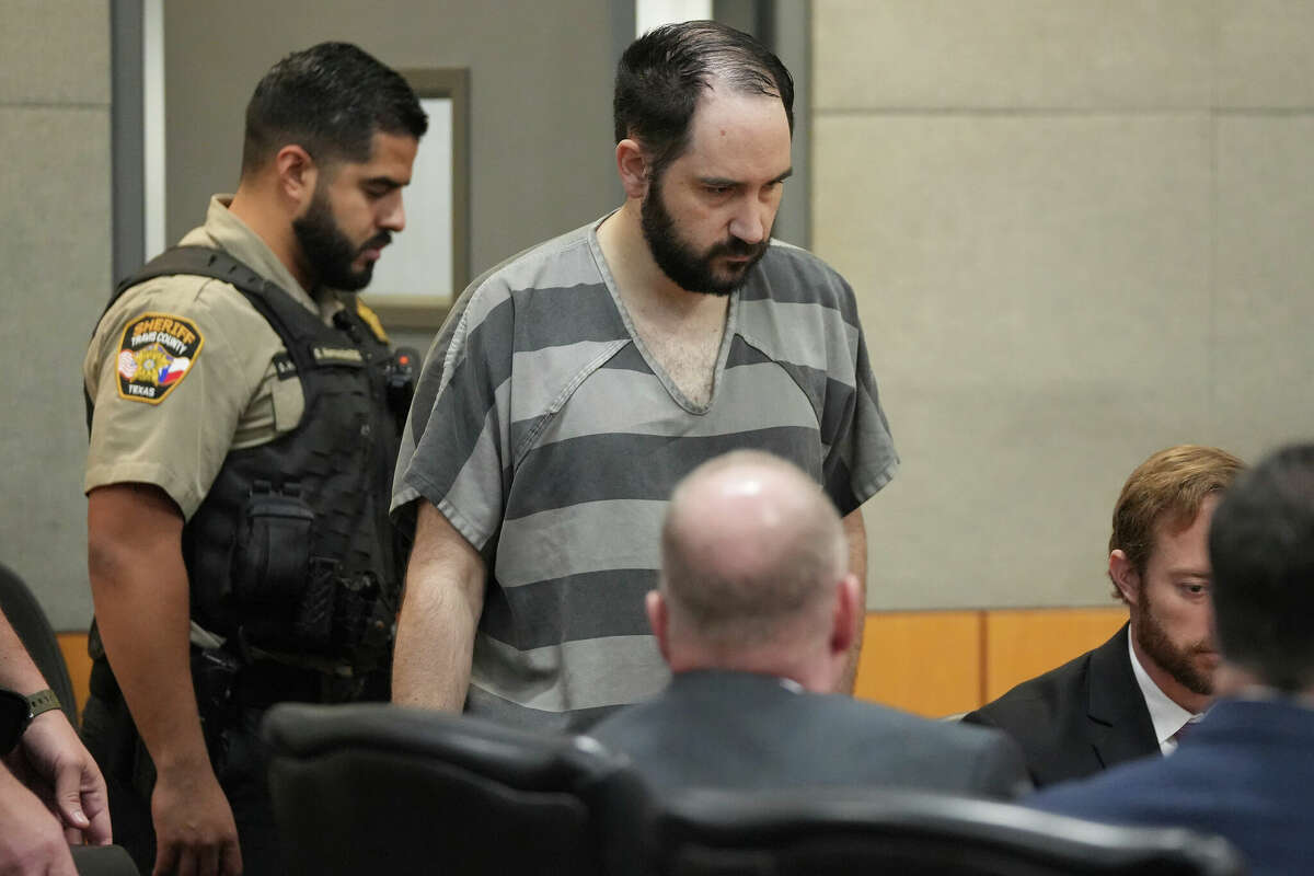 FILE - Daniel Perry enters the courtroom at the Blackwell-Thurman Criminal Justice Center, May 10, 2023, in Austin, Texas. The Texas Board of Pardons and Paroles on Thursday, May 16, 2024, recommended a full pardon for Perry, a former U.S. Army sergeant convicted of murder for fatally shooting an armed demonstrator in 2020 during nationwide protests against police violence and racial injustice. (Jay Janner/Austin American-Statesman via AP, Pool, File)