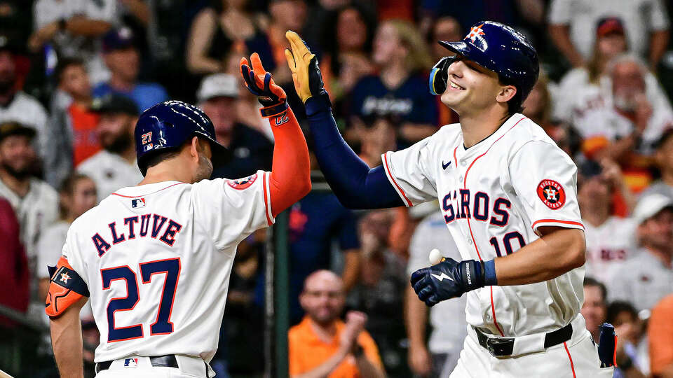 Joey Loperfido #10 celebrates with Jose Altuve #27 of the Houston Astros after hitting a two-run home run in the third inning against the Oakland Athletics at Minute Maid Park on May 16, 2024 in Houston, Texas. (Photo by Logan Riely/Getty Images)