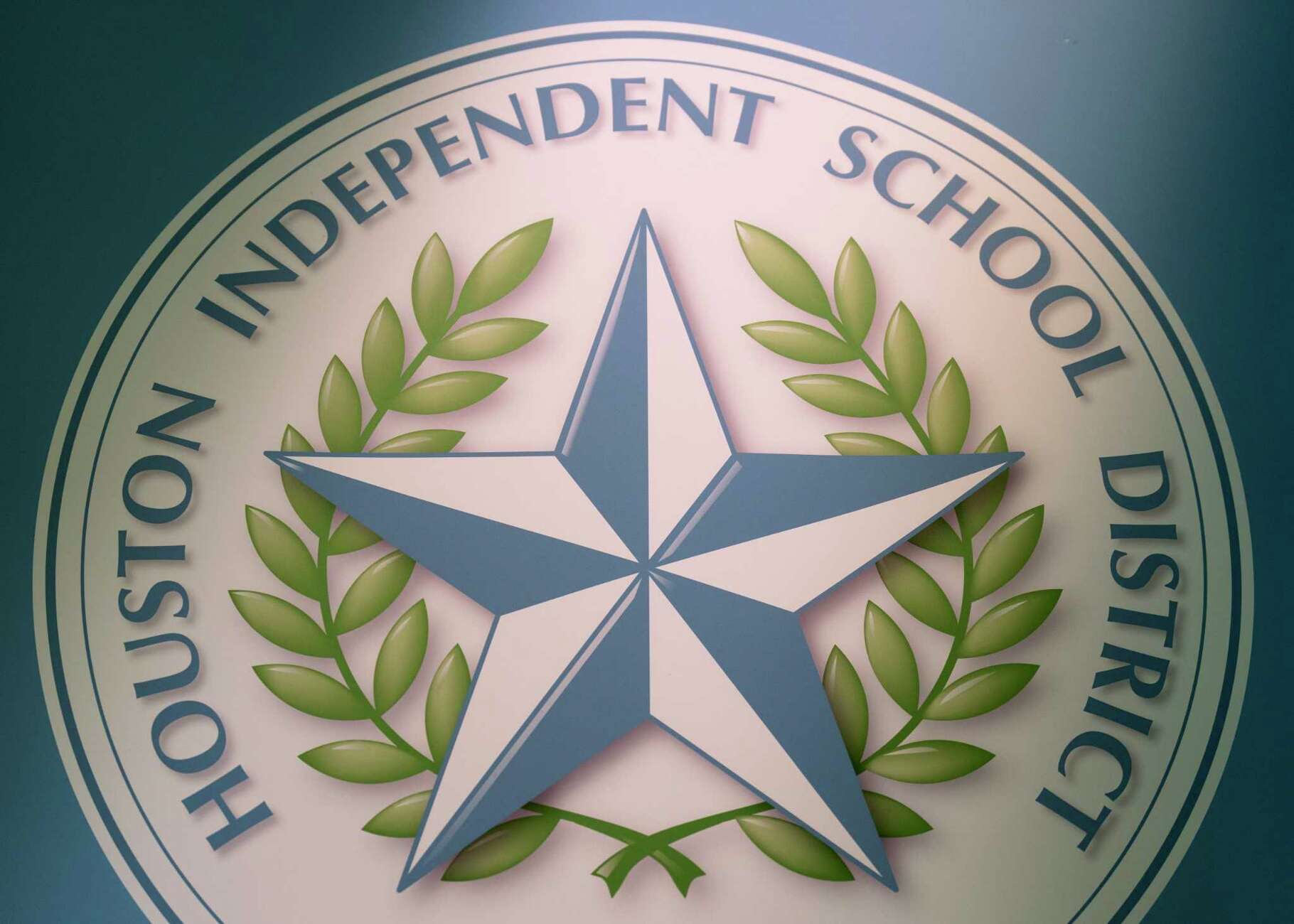 The Houston ISD seal is seen before Superintendent Mike Miles speaks before the district’s first public budget workshop for the 2024-2025 school year at the Hattie Mae White Educational Support Center, Thursday, May 15, 2024, in Houston.