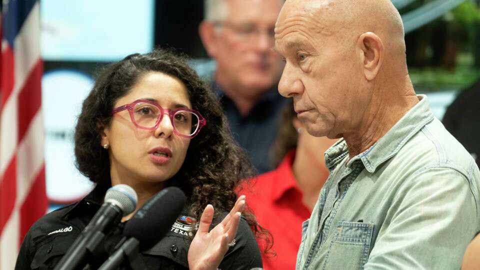 Harris County Judge Lina Hidalgo, left, exchanges words with Houston Mayor John Whitmire as they update the public following Thursday's storms which brought damaging winds and rains to the Greater Houston area during a press conference at Houston TranStar, Friday, May 17, 2024, in Houston.