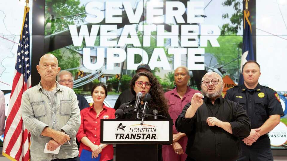 Harris County Judge Lina Hidalgo, center, speaks alongside Houston Mayor John Whitmire as they update the public after Thursday's storms which brought damaging winds and rains to the Greater Houston area during a press conference at Houston TranStar, Friday, May 17, 2024, in Houston. (Jason Fochtman/Houston Chronicle)