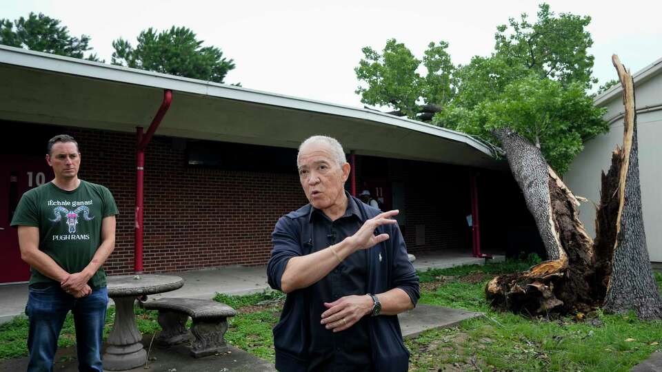 Houston Independent School District F. Mike Miles gives a press conference regarding to the storm damage assessment of the school district while a tree in the courtyard fell over Thursday night and damaged a classroom Friday, May 17, 2024 at Pugh Elementary School in Houston. Miles said the school district is planning to be back on Monday. On the left is Pugh Elementary School Principal Keith Garcia.