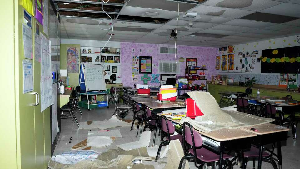 A portable classroom is damaged from Thursday's storm Friday, May 17, 2024 at Pugh Elementary School in Houston. The portable building sustained roof and ceiling damages. Two portable classrooms were damaged and one regular classroom also sustained damages from a tree fell through the roof.