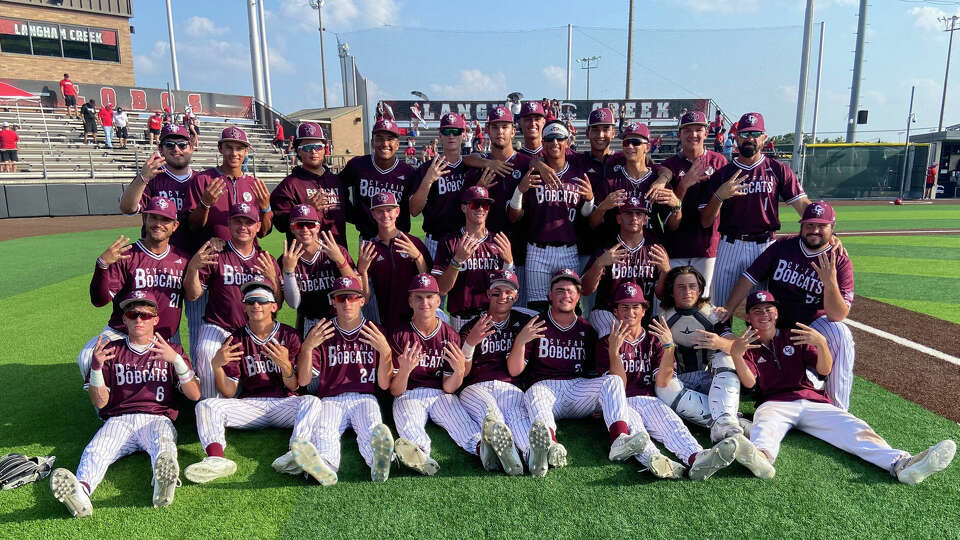 Cy-Fair baseball players pose for a photo after the Bobcats' 7-5 Game 3 regional quarterfinal win over Katy at Langham Creek High School on Saturday. The Bobcats are headed to the regional semifinals for the first time since 2018.