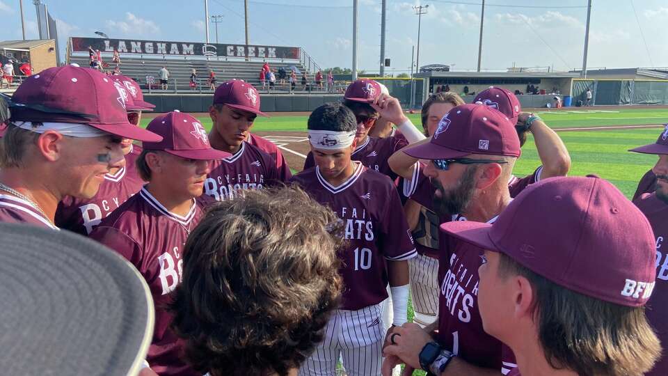 Cy-Fair coach Billy J. Hardin talks to his team after the Bobcats' 7-5 Game 3 regional quarterfinal win over Katy at Langham Creek High School on Saturday. The Bobcats are headed to the regional semifinals for the first time since 2018.