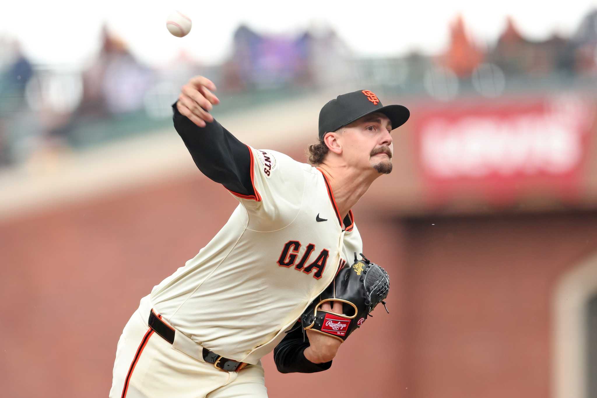 What pitch does Giants reliever Sean Hjelle credit for his success?