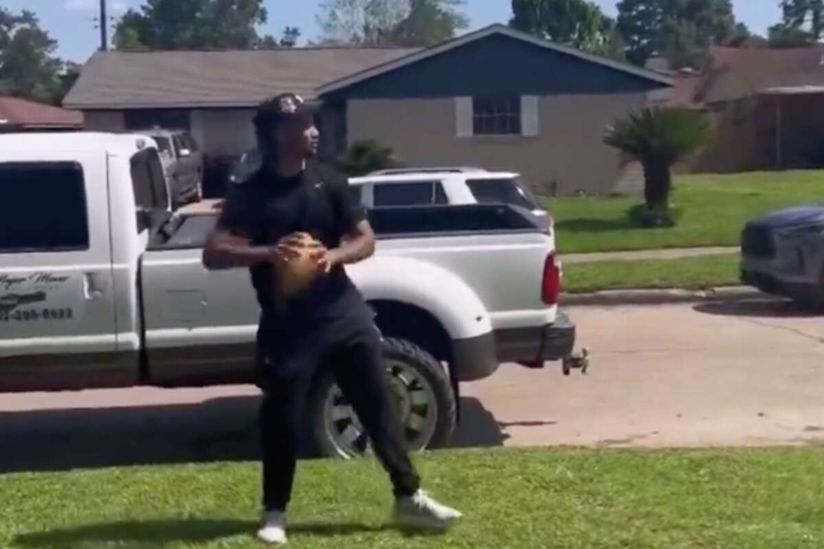 C.J. Stroud seen throwing a football with fellow Houstonians in the aftermath of a severe storm that knocked out power to more than 1 million people in Harris County on Thursday.