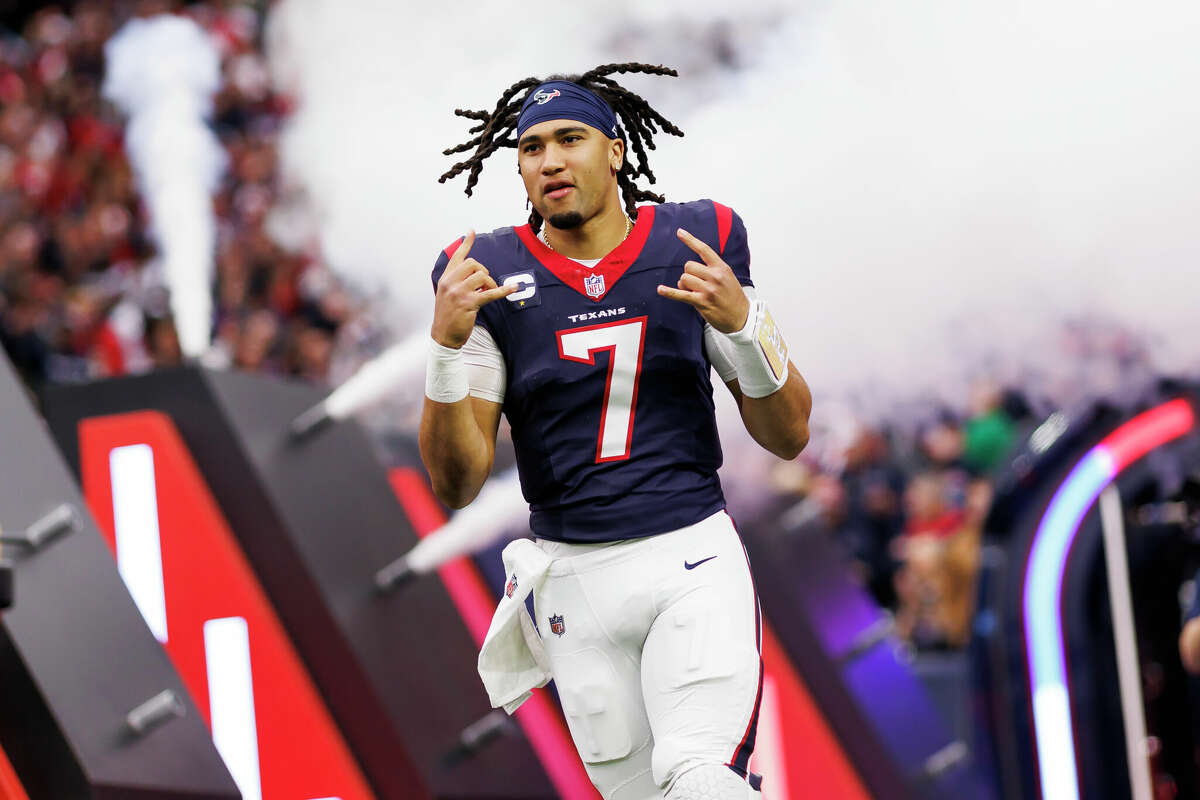 C.J. Stroud #7 of the Houston Texans celebrates as he runs onto the field during player introductions before an AFC wild-card playoff football game against the Cleveland Browns at NRG Stadium on January 13, 2024 in Houston, Texas.