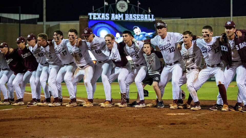 The Texas A&M baseball team sings the Aggie War Hymn after the walk-off win in game one of the series between Arkansas and Texas A&M on Thursday, May 16, 2024 at Blue Bell Park in College Station. (Meredith Seaver/College Station Eagle via AP)