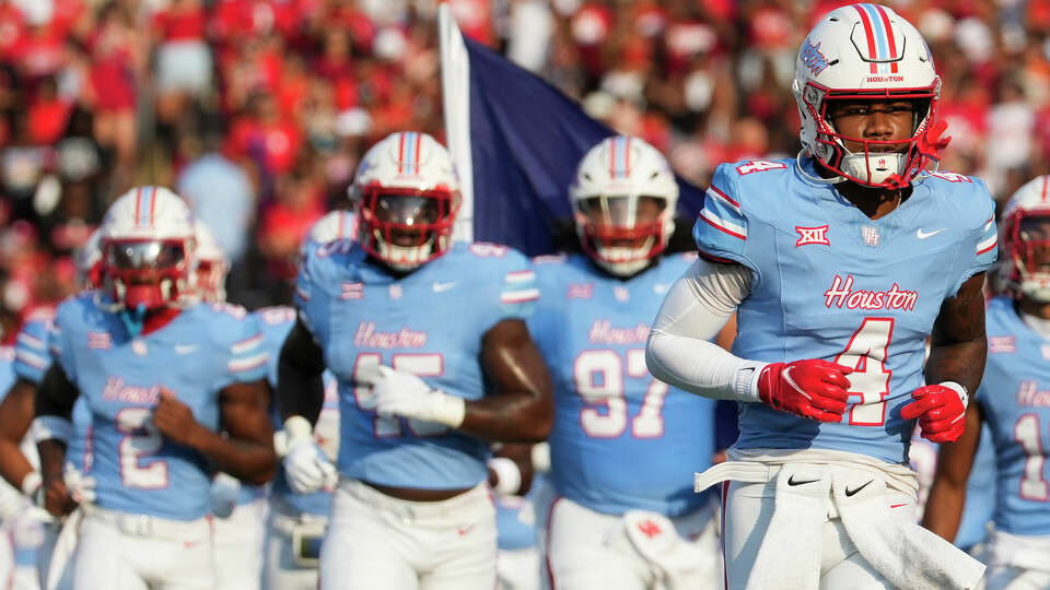 Houston players take the field before an NCAA college football game against UTSA at TDECU Stadium, Saturday, Sept. 2, 2023, in Houston.