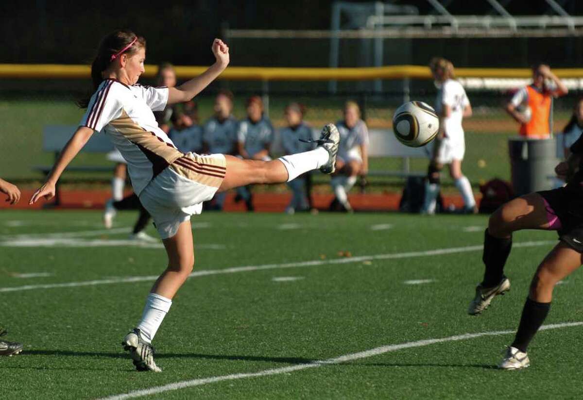 St. Joseph's #7 Katie Danaher kicks away the ball during girls soccer action against Trumbull in Trumbull, Conn. on Thursday October 28, 2010.