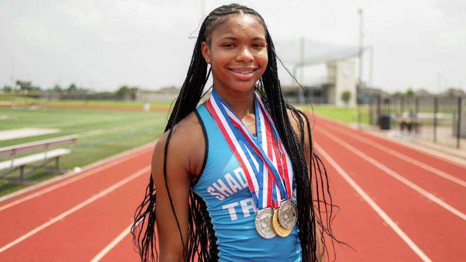 Shadow Creek High School junior Mackenzie Collins enjoys a moment at her high school track Tuesday, May 21, 2024, after being selected All-Greater Houston Girls Track and Field Athlete of the Year