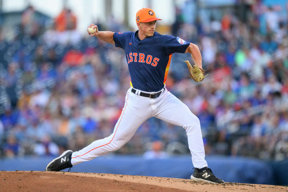 Houston Astros pitcher Logan VanWey (97) throws the ball from the mound during an MLB spring training game between the New York Mets and the Houston Astros at the Cacti Park of the Palm Beaches on March 16, 2024 in West Palm Beach, Florida. 