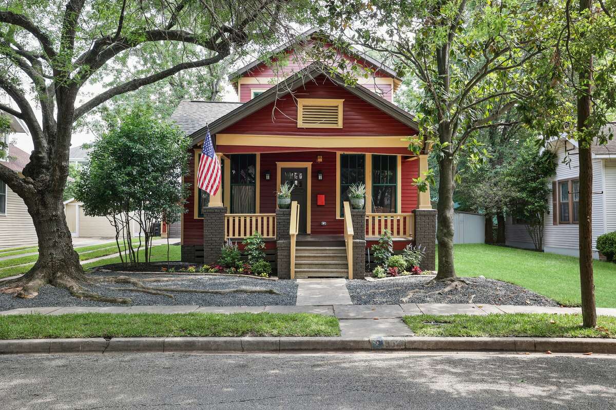 The 1920s bungalow is located in one of the shady spots of Woodland Heights. The design and construction was done by Plum Construction. Staging and styling by Lonesome Pine Home.