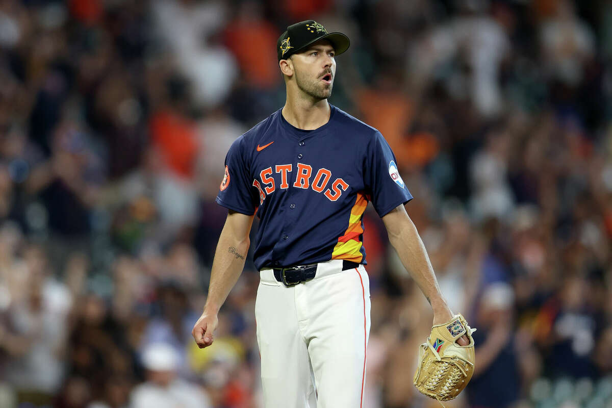 HOUSTON, TEXAS - MAY 19: Tayler Scott #50 of the Houston Astros reacts in the ninth inning against the Milwaukee Brewers at Minute Maid Park on May 19, 2024 in Houston, Texas. (Photo by Tim Warner/Getty Images)