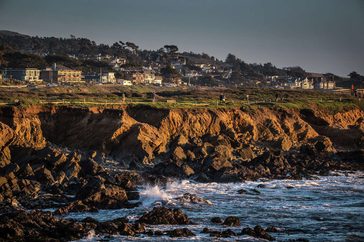 FILE - The cliffs at Moonstone Beach are viewed at sunset on February 20, 2019, in Cambria, California. 