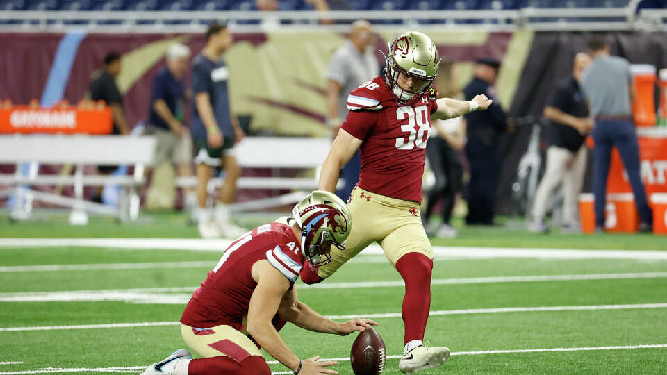 DETROIT, MICHIGAN - MAY 05: Jake Bates #38 of the Michigan Panthers warms up with Brock Miller #41 of the Michigan Panthers before the game against the Arlington Renegades at Ford Field on May 05, 2024 in Detroit, Michigan. (Photo by Rick Osentoski/UFL/Getty Images)